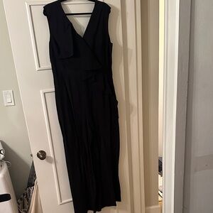 Elegant Black Sleeveless Pants Onsie with Flattering Front Ruffle